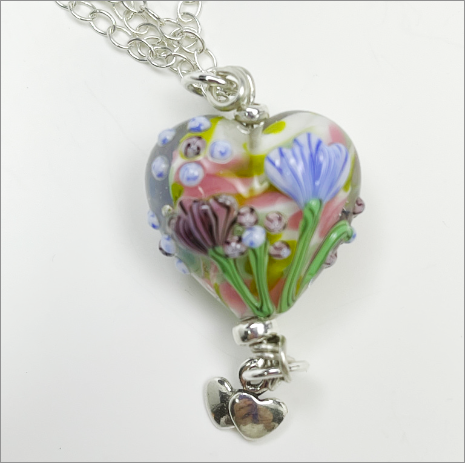 Artisan floral heart lampwork necklace.